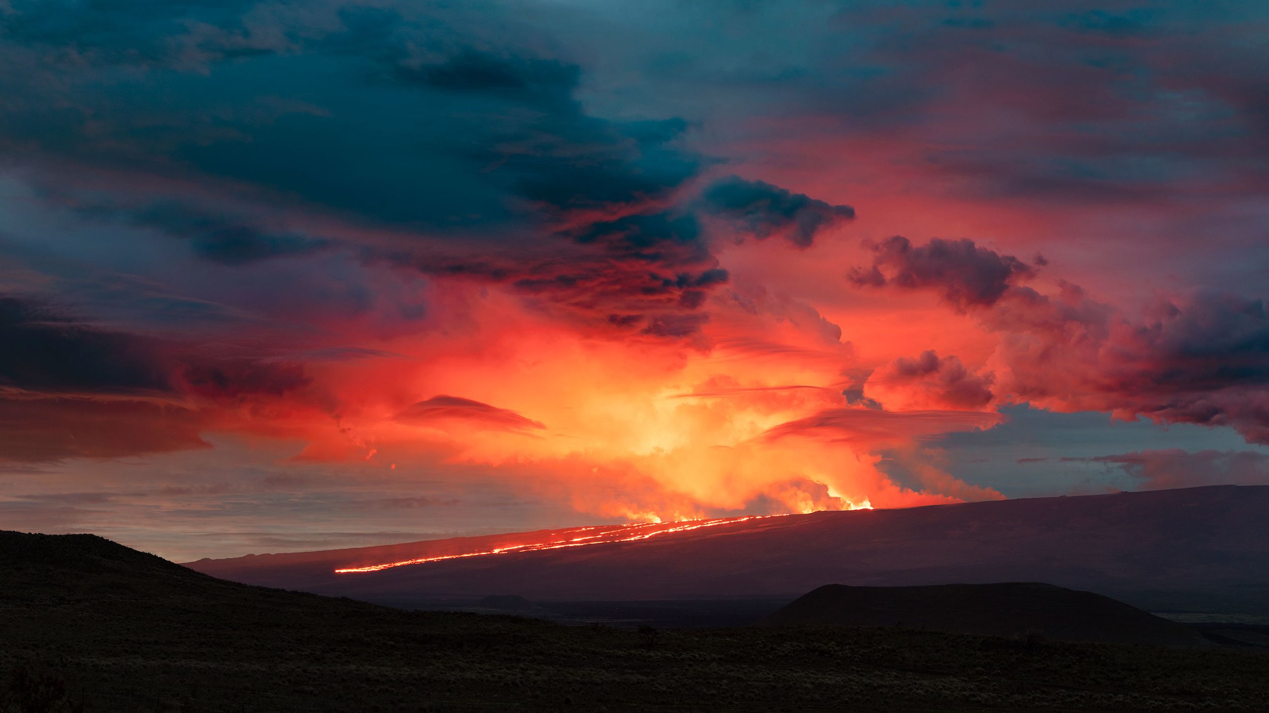 In a photograph by Kale, lava can be seen flowing from Mauna Loa on November 29. 
