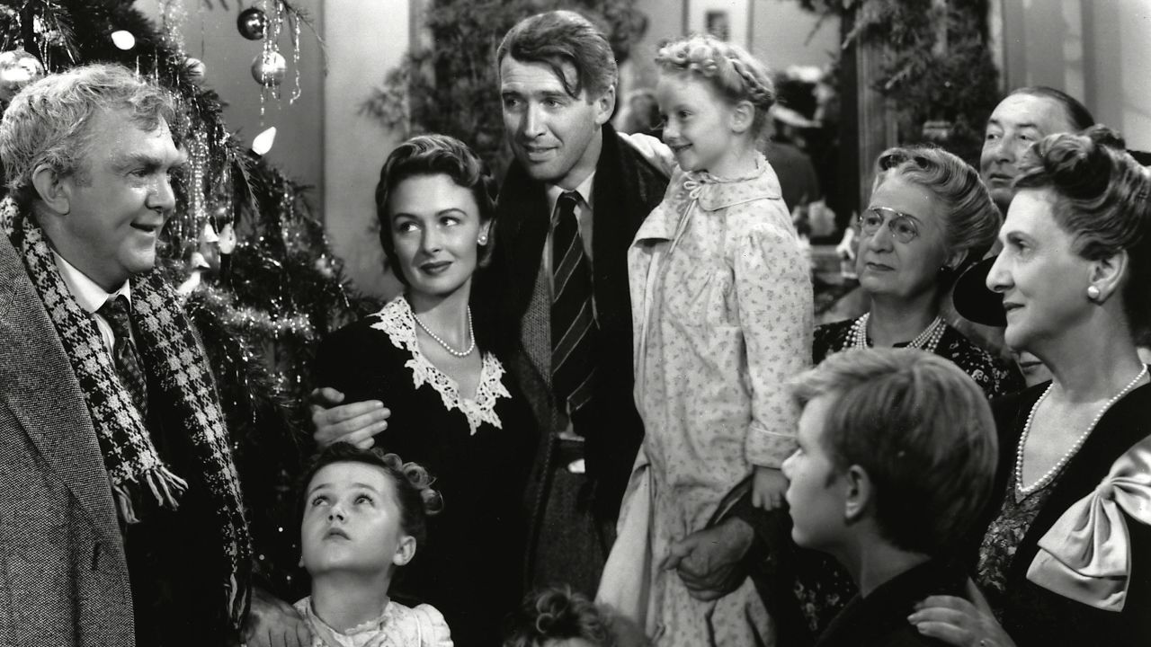 "It's A Wonderful Life" was released in 1946 before finding a home on our TV screens. From left: Thomas Mitchell,  Carol Coombs,  Donna Reed,  James Stewart,  Jimmy Hawkins,  Karolyn Grimes,  Larry Simms.