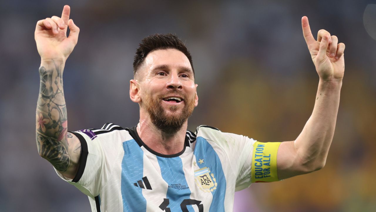 Messi celebrates Argentina's victory against Australia in the round of 16.