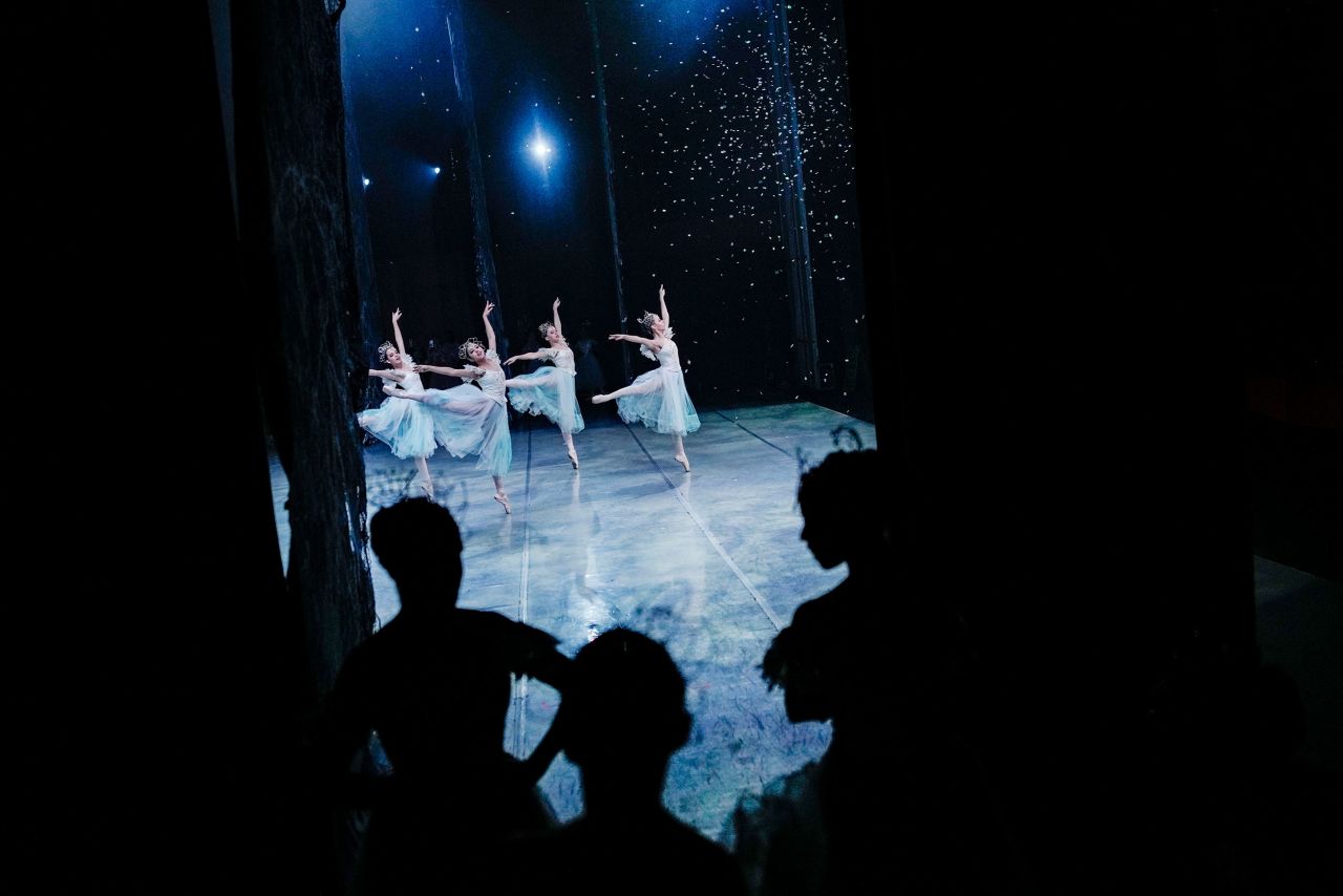 Ballet dancers go over their routines during a rehearsal of 