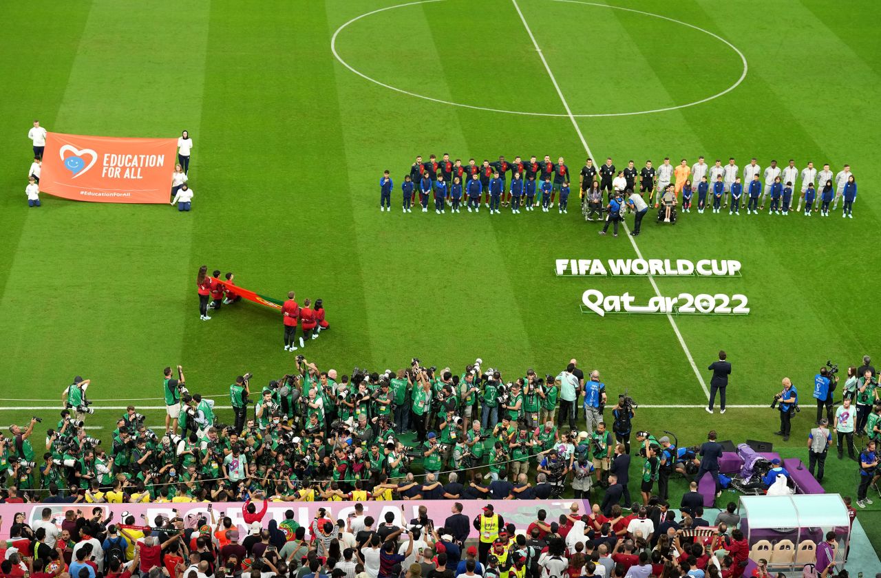 Photographers gather in front of Portugal's bench before the team's World Cup match against Switzerland on Tuesday, December 6. They were focused on superstar striker Cristiano Ronaldo, who was <a href=