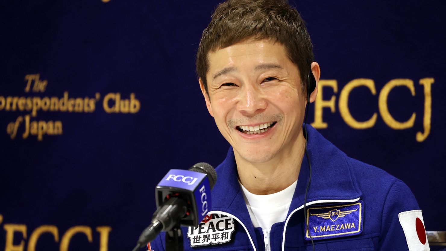 Japanese fashion mogul Yusaku Maezawa has chosen eight passengers who will join him on a trip around the moon on the SpaceX Starship spacecraft. He's seen in Tokyo on January 7. 