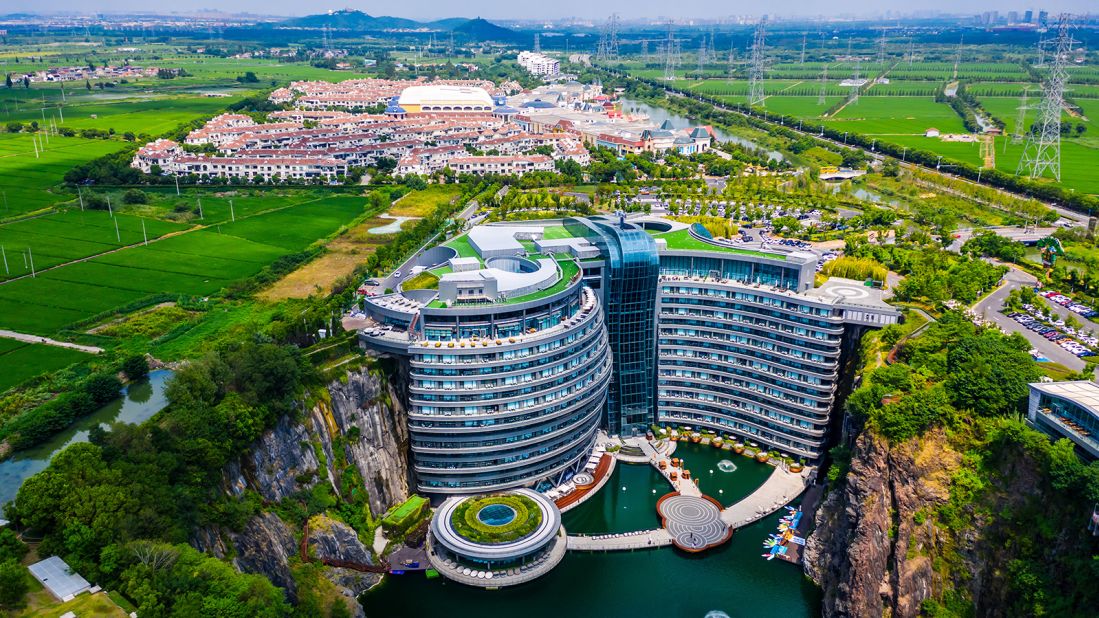 The Shenkeng Intercontinental Hotel in China, which opened in 2018, descends deep into the side of a rock quarry for a mix of underground feel and natural light.