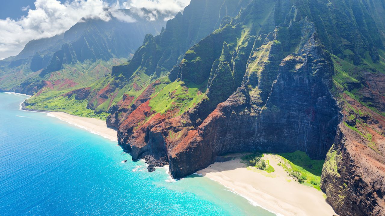 <strong>Nā Pali Coast, Hawaii: </strong>Sheltered by a series of contiguous state parks, natural areas and forest reserves, Nā Pali and Waimea Canyon in Kauaʻi are a haven for many rare plants and birds.