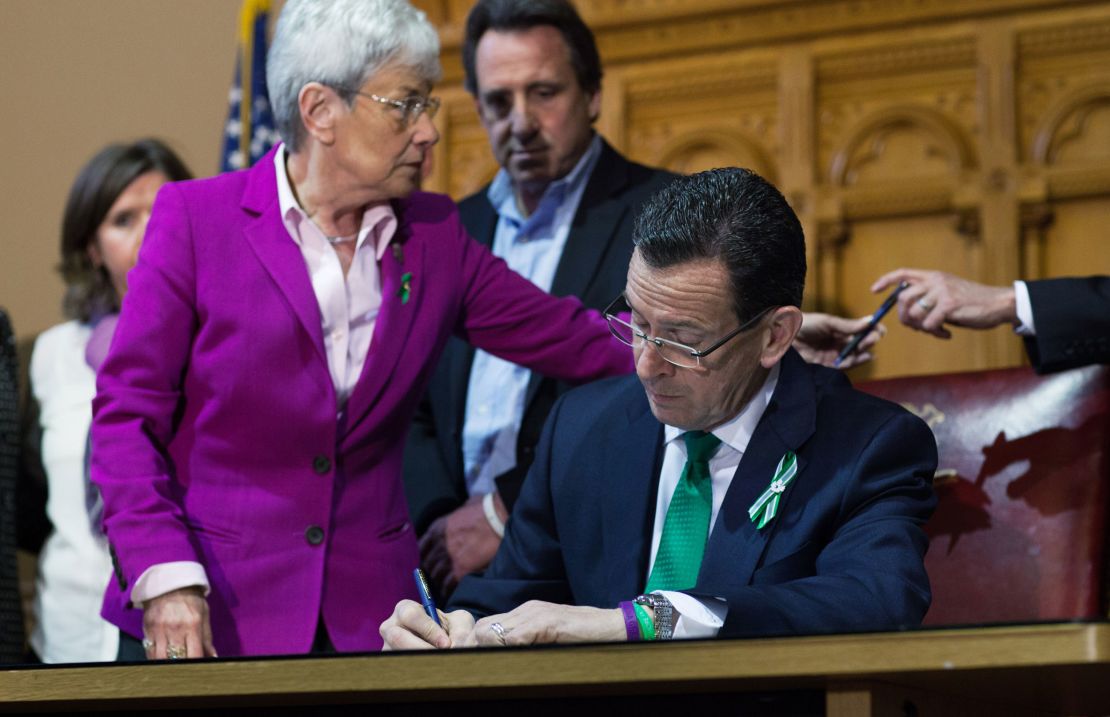 Connecticut Gov. Dannel Malloy (R) signs a gun-control bill on April 4, 2013. 