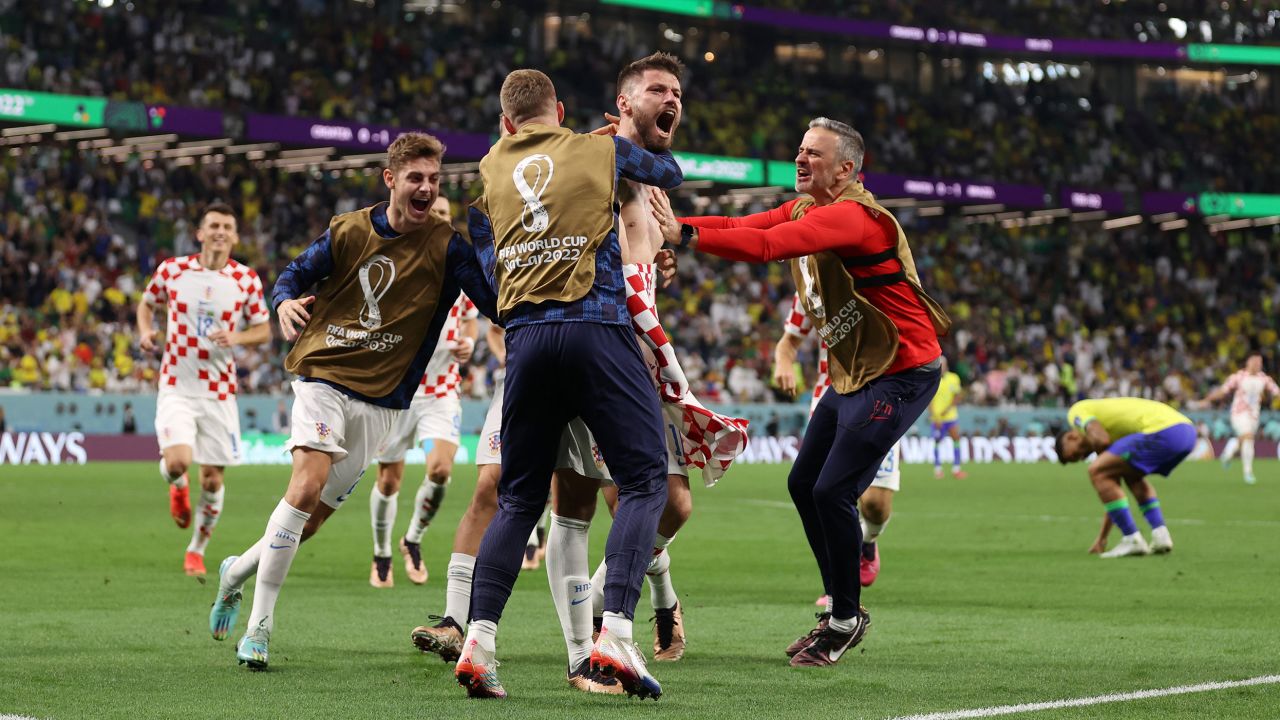 Bruno Petkovic celebrates after scoring Croatia's equalizer. 