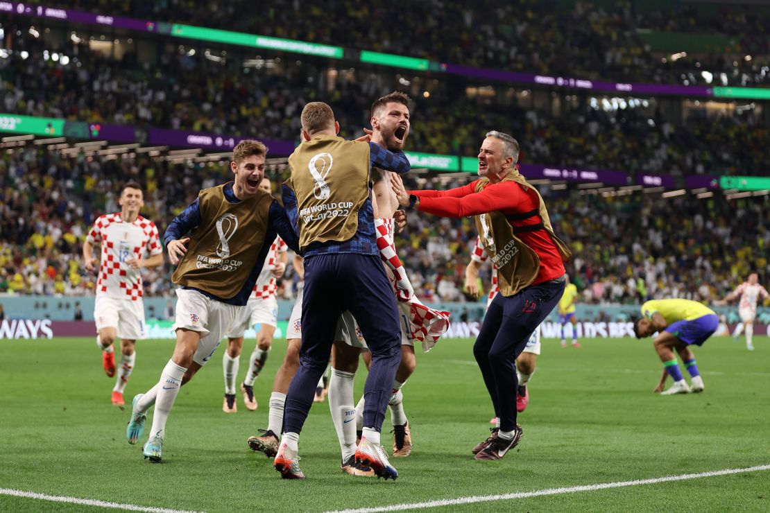 Bruno Petkovic celebrates after scoring Croatia's equalizer. 