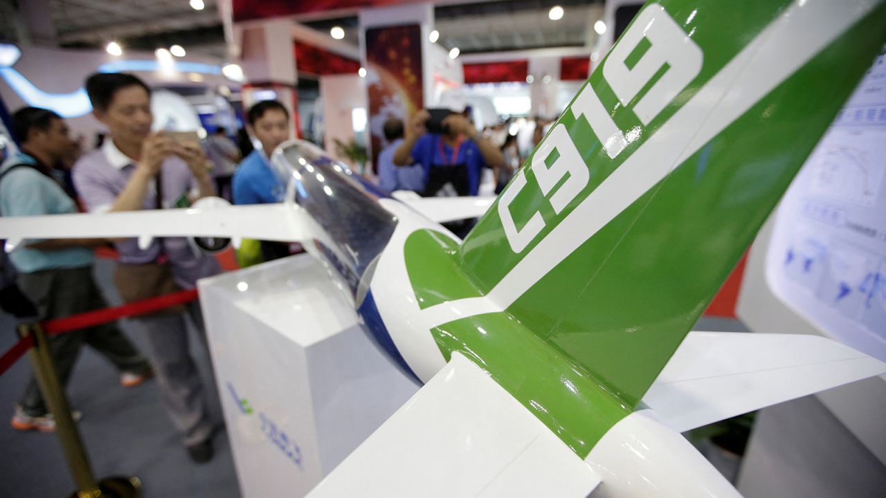 A model of a C919 airliner by Commercial Aircraft Corp of China (COMAC) is displayed at China Beijing International High-tech Expo in Beijing, China on June 8, 2017. 
