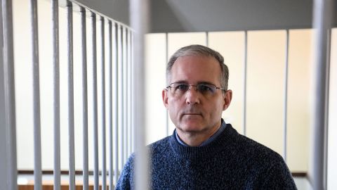 Paul Whelan, a former US Marine accused of spying and arrested in Russia ,stands inside a defendants' cage during a hearing at a court in Moscow on August 23, 2019.