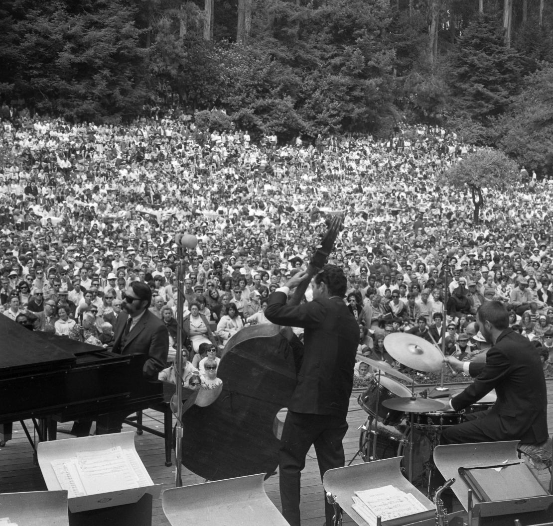 Vince Guaraldi, left, plays piano at a jazz festival in 1966.