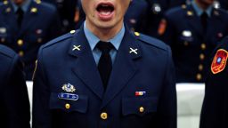 A graduating cadet sings the national anthem during the joint military academies graduation ceremony, in Taipei, Taiwan June 29, 2018. 