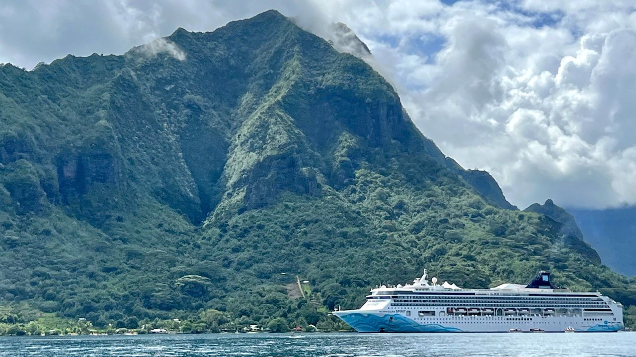 Jay and Carmen enjoyed their Honeymoon do-over on board the Norwegian Spirit, pictured here docked in Moorea.