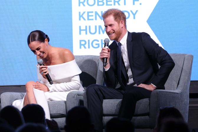 Meghan and Harry laugh while on stage at the Robert F. Kennedy Human Rights Ripple of Hope Gala, which was held in New York in December 2022.