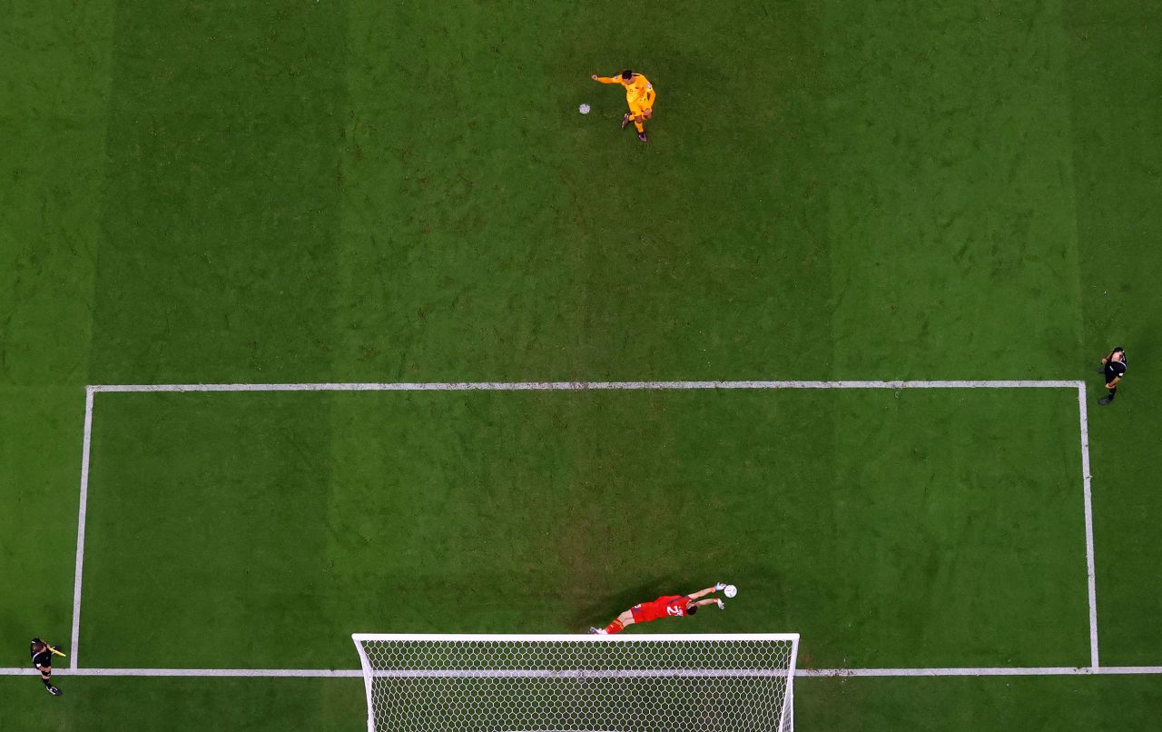 Martinez saves the penalty of Dutch captain Virgil van Dijk early in the shootout. Martinez made two saves in the shootout, which finished 4-3 for Argentina.