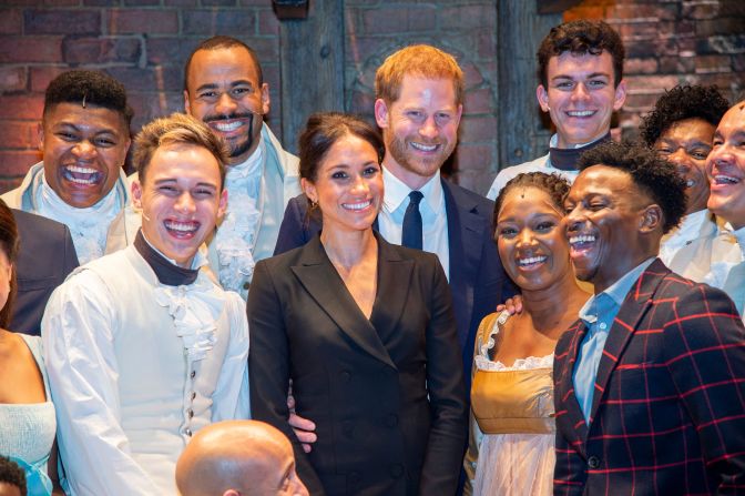 Meghan and Harry pose with the cast and crew of the musical "Hamilton" after a performance in London in August 2018. Harry gave those in the theater something to remember after <a target="_blank">breaking into mock-song</a> at the end of the show. The show was held to raise money for his HIV charity, Sentebale.