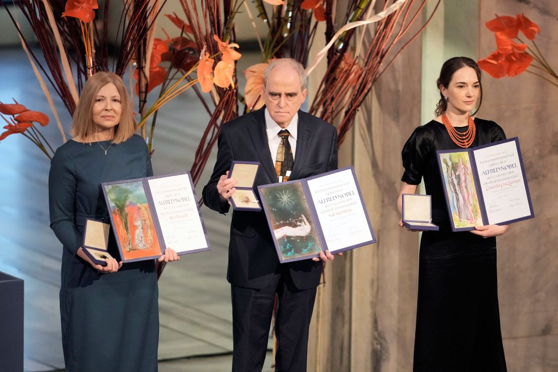 Representatives of the 2022 Nobel Peace Prize laureates collect the awards at Oslo City Hall, from left: Natalia Pinchuk, the wife of Ales Bialiatski, Yan Rachinsky, chairman of the International Memorial Board and Oleksandra Matviychuk, head of the Ukraine's Center for Civil Liberties.