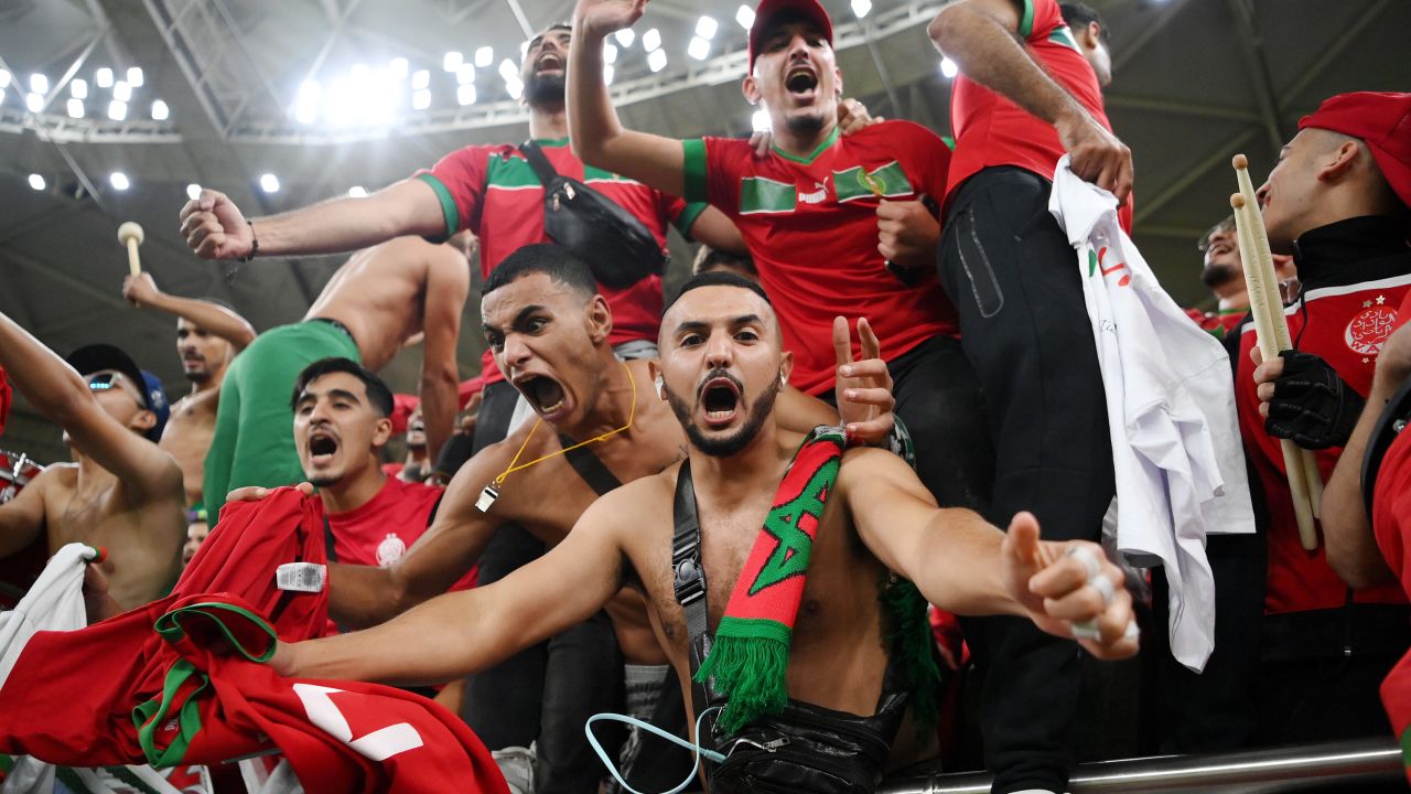 Morocco fans celebrate after their team's victory over Portugal on December 10, 2022 in Doha, Qatar. 