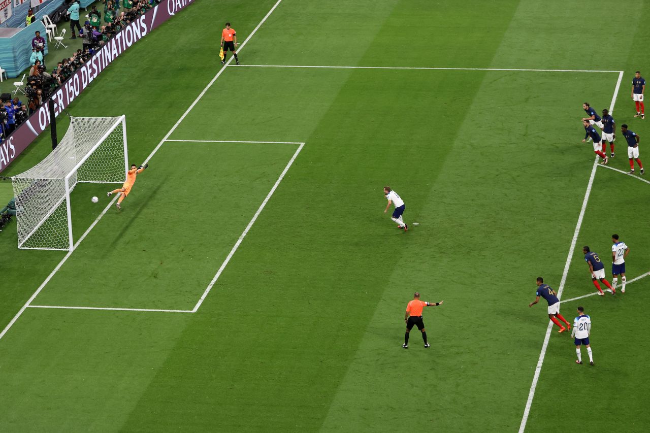 England's Harry Kane scores a penalty to even up the score against France. But he missed a penalty in the second half with France leading 2-1.