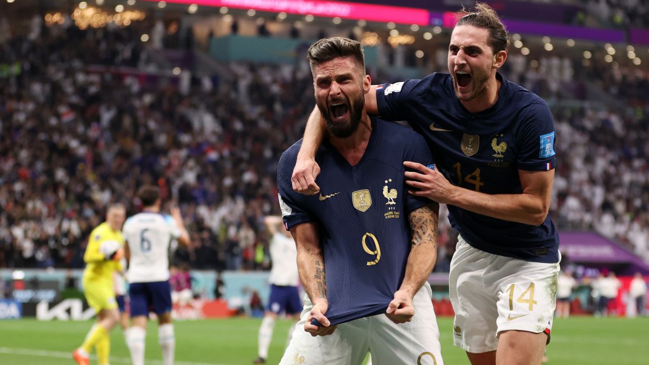 Giroud celebrates after scoring France's second goal against England.