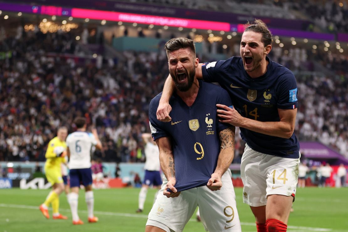 Giroud celebrates after scoring France's second goal against England.