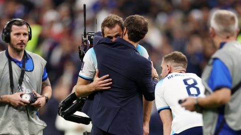 Southgate consoles Kane after England's loss to France.