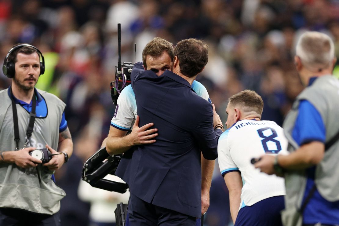 Southgate consoles Kane after England's defeat to France.