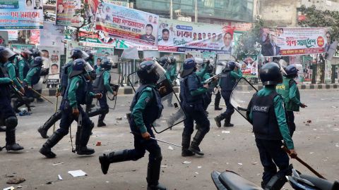 Bangladeshi policemen disperse Bangladesh Nationalist Party (BNP) activists on December 7, 2022.