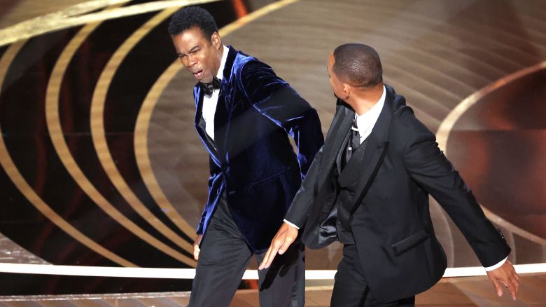 Chris Rock and Will Smith onstage during the show  at the 94th Academy Awards at the Dolby Theatre at Ovation Hollywood on Sunday, March 27, 2022.