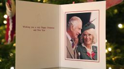 A view of Britain's King Charles III and Camilla, the Queen Consort's 2022 Christmas card released on Sunday, Dec. 11, 2022 taken in front of a Christmas Tree, at Clarence House, London. The photograph of the Royals was taken at the Braemar Games on the Sept. 3, 2022 by Samir Hussein. 