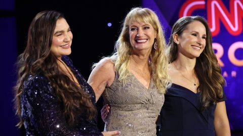 Ayda Zugay, Tracy Peck and Vanja Contino, from left, appear onstage during the 16th annual "CNN Heroes: An All-Star Tribute" on Sunday at the American Museum of Natural History in New York City. 