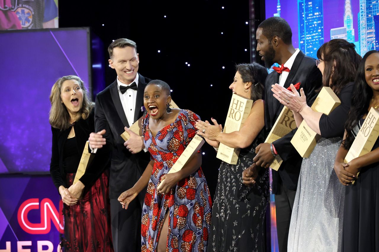 Nelly Cheboi, third from left, reacts as she is named 2022 Hero of the Year. Cheboi's nonprofit, TechLit Africa, has provided thousands of students in rural Kenya with access to donated, upcycled computers — and the chance at a brighter future.