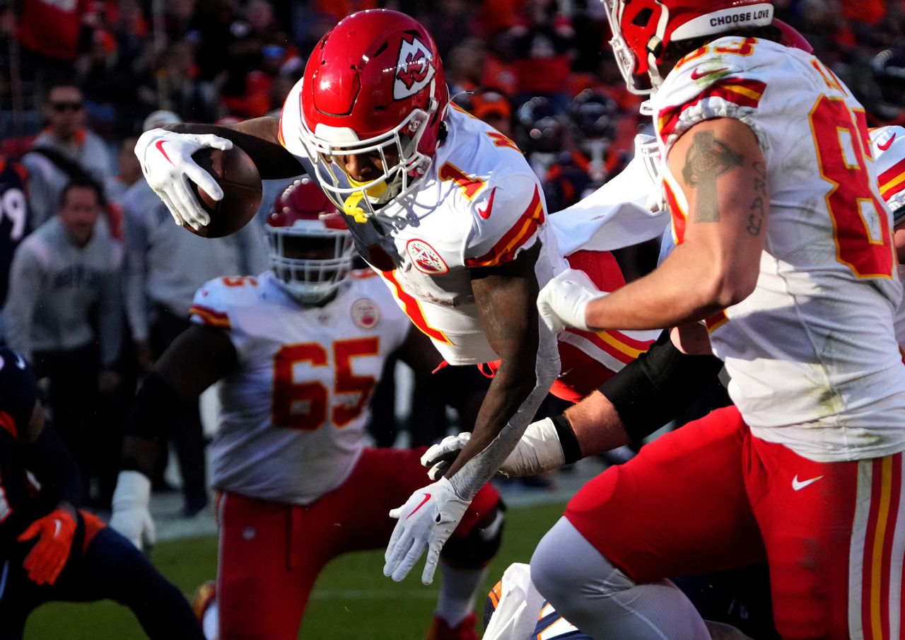 Kansas City Chiefs running back Jerick McKinnon dives for a touchdown against the Denver Broncos on December 11. McKinnon scored two receiving touchdowns in the game, and the Chiefs won 34-28.
