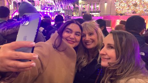 The trio snap a selfie Saturday night at Rockefeller Center in New York.