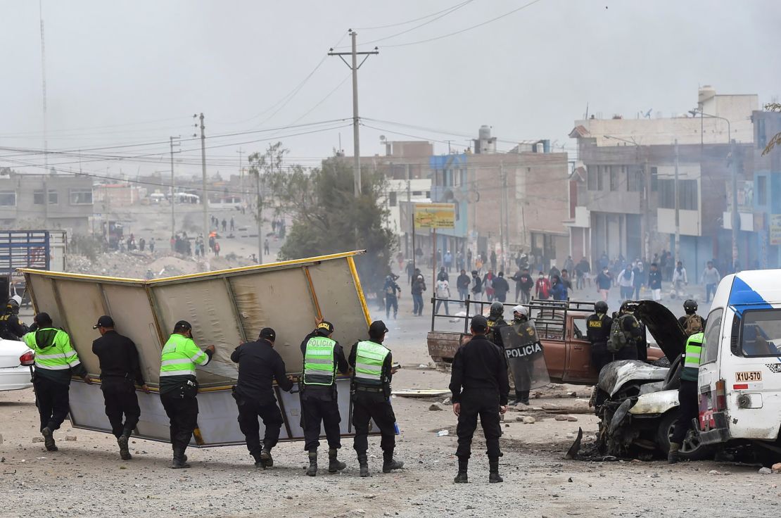 Police officers clash with protesters in Arequipa, Peru December 12, 2022.