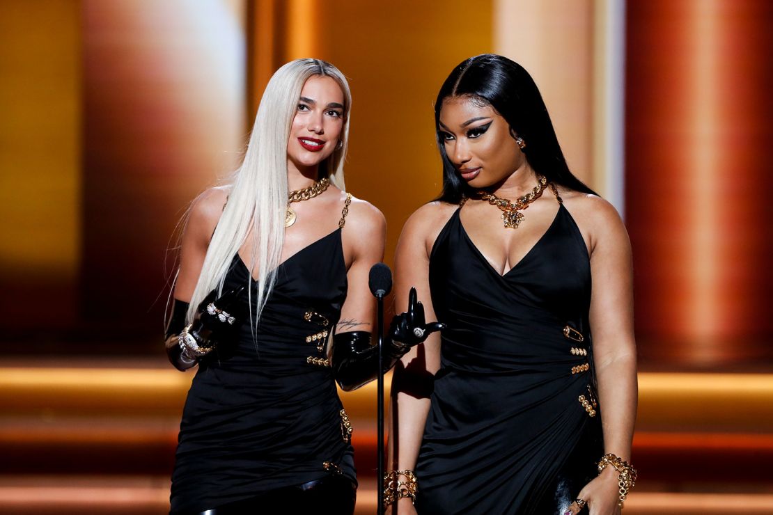 Musicians Dua Lipa and Megan Thee Stallion recreated pop culture history when they wore the same Versace dress in a bit for the Grammy Awards.