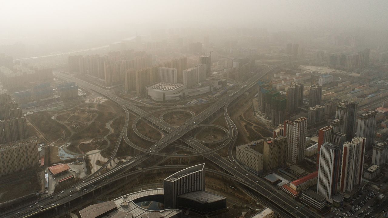 Sand and dust blanket the city of Hohhot in Inner Mongolia on Monday.