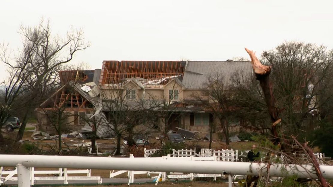 A damaged home is seen Tuesday morning in Parker, Texas, outside Dallas.