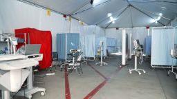 UC San Diego Health tents are setup in parking lots to triage patients.