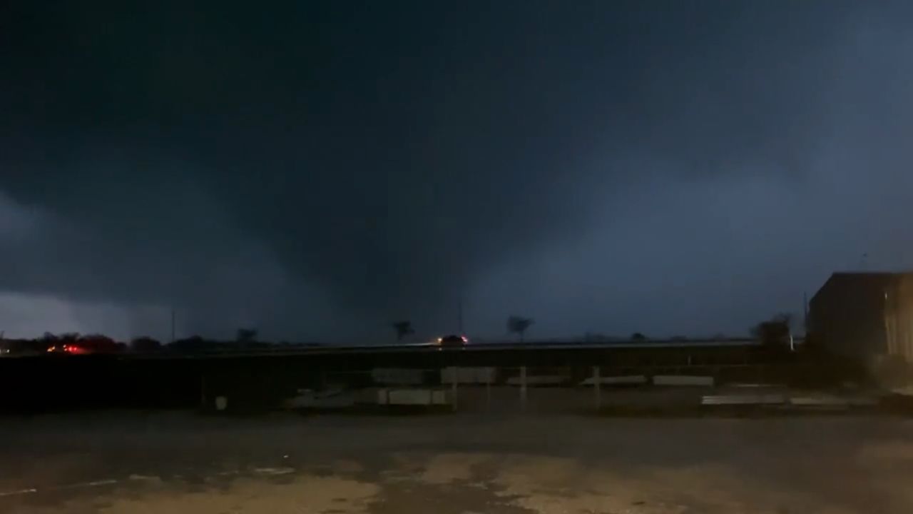 "Everything was calm, and then I just saw a huge wall cloud," said Darrell Barton of the storm effect he spotted early Tuesday around Decatur, Texas. "The rain and lightning was insane." 