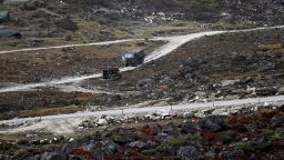 An Indian Army truck drives along a road to Tawang, near the Line of Actual Control (LAC), neighbouring China, near Sela Pass in India's Arunachal Pradesh state on October 21, 2021.