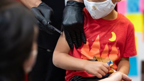 The guidance differs for kids 5 and under who received Pfizer's Covid-19 vaccine vs. Moderna's version. A 4-year-old receives a Covid vaccine in Schwenksville, Pennsylvania, June 21. (Reuters/Hannah Beier)
