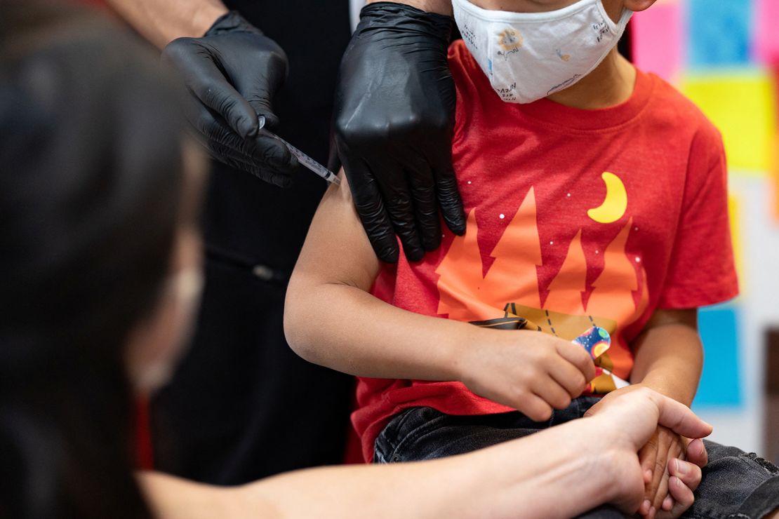 The guidance differs for kids 5 and under who received Pfizer's Covid-19 vaccine vs. Moderna's version. A 4-year-old receives a Covid vaccine in Schwenksville, Pennsylvania, June 21. (Reuters/Hannah Beier)