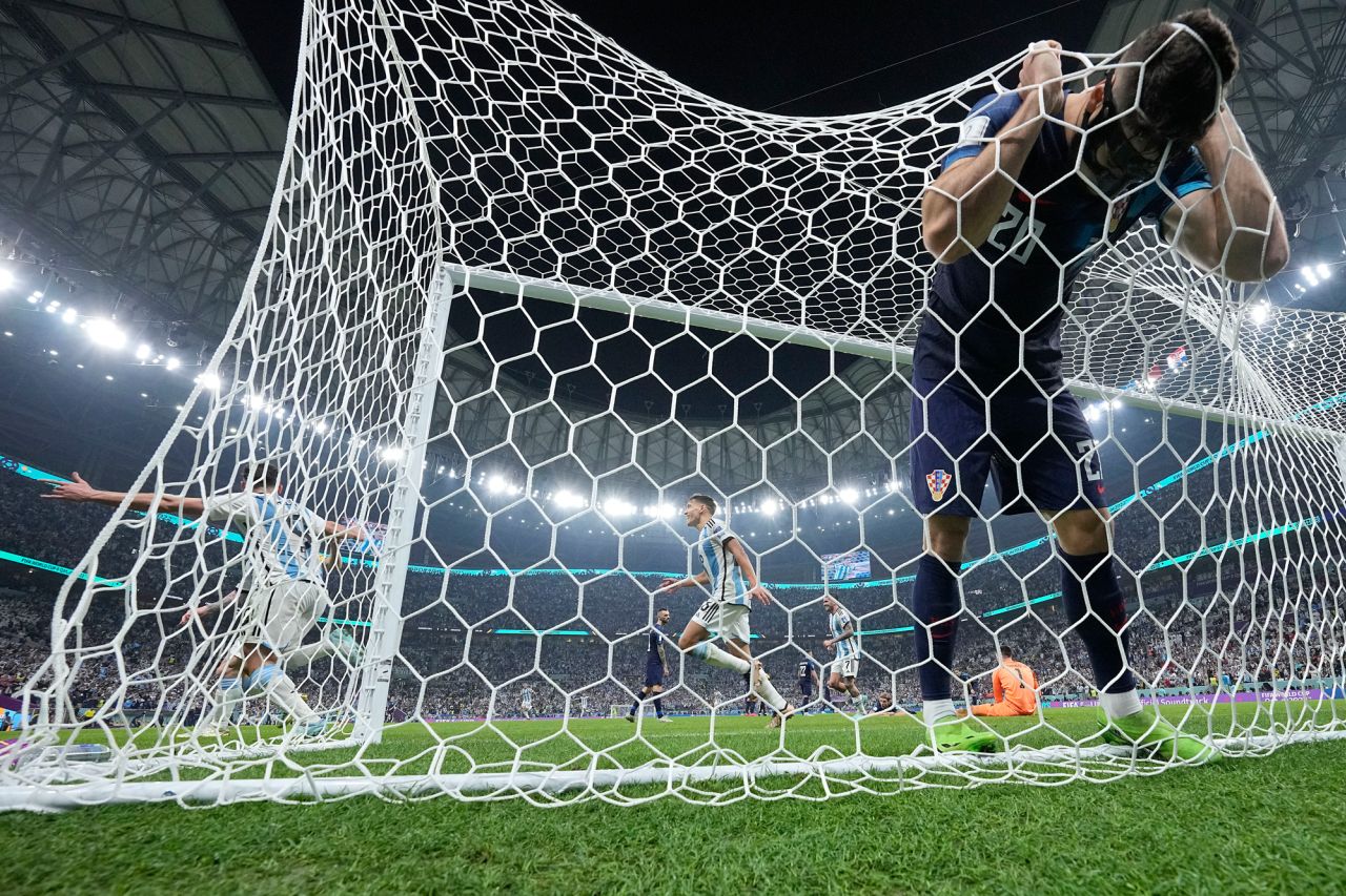 Croatian defender Joško Gvardiol reacts in the net after Álvarez scored to put Argentina up 3-0.