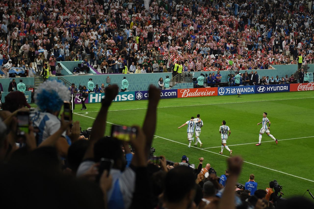 Argentina players celebrate their 2-0 lead in the first half.