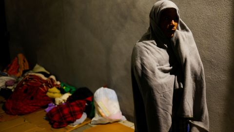 A migrant from Nicaragua stands near a bus station after being released from US Border Patrol custody Monday in El Paso.