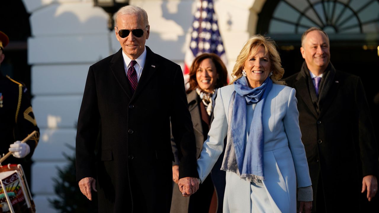 President Joe Biden and first lady Jill Biden, arrive with Vice President Kamala Harris and and her husband Doug Emhoff, during a bill signing ceremony for the Respect for Marriage Act, Tuesday, Dec. 13, 2022, on the South Lawn of the White House in Washington. 