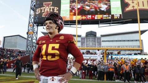 Purdy celebrates at midfield after the Iowa State Cyclones defeated the Oklahoma State Cowboys 24-21 at Jack Trice Stadium on October 23, 2021 in Ames, Iowa.