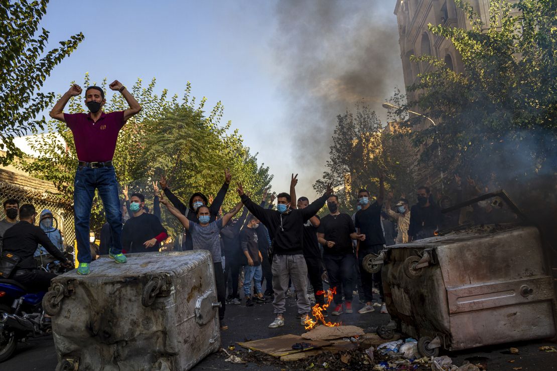 Iranians protest the death of 22-year-old Mahsa Amini after she was detained by the morality police, in Tehran on October 27, 2022.