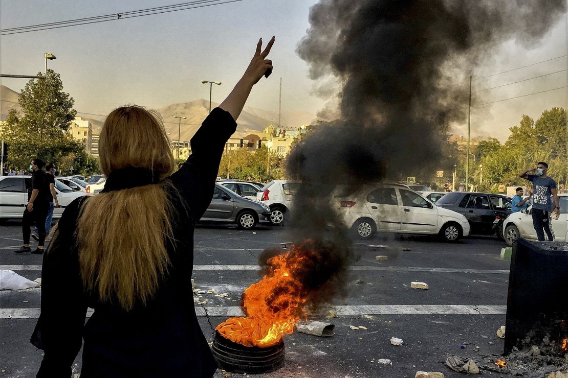 Iranians protest the death of 22-year-old Mahsa Amini after she was detained by the morality police, in Tehran, Iran, on October 1, 2022.