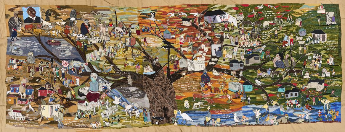 Created in response to the coronavirus pandemic, "Covid Resilience Tapestry" (2022) is 2.5 x 7.5 meters (8 x 23 feet). The tapestry depicts the natural world watching on as humans navigate the difficult period from isolation, hospitalization and death to vaccination and reunion.